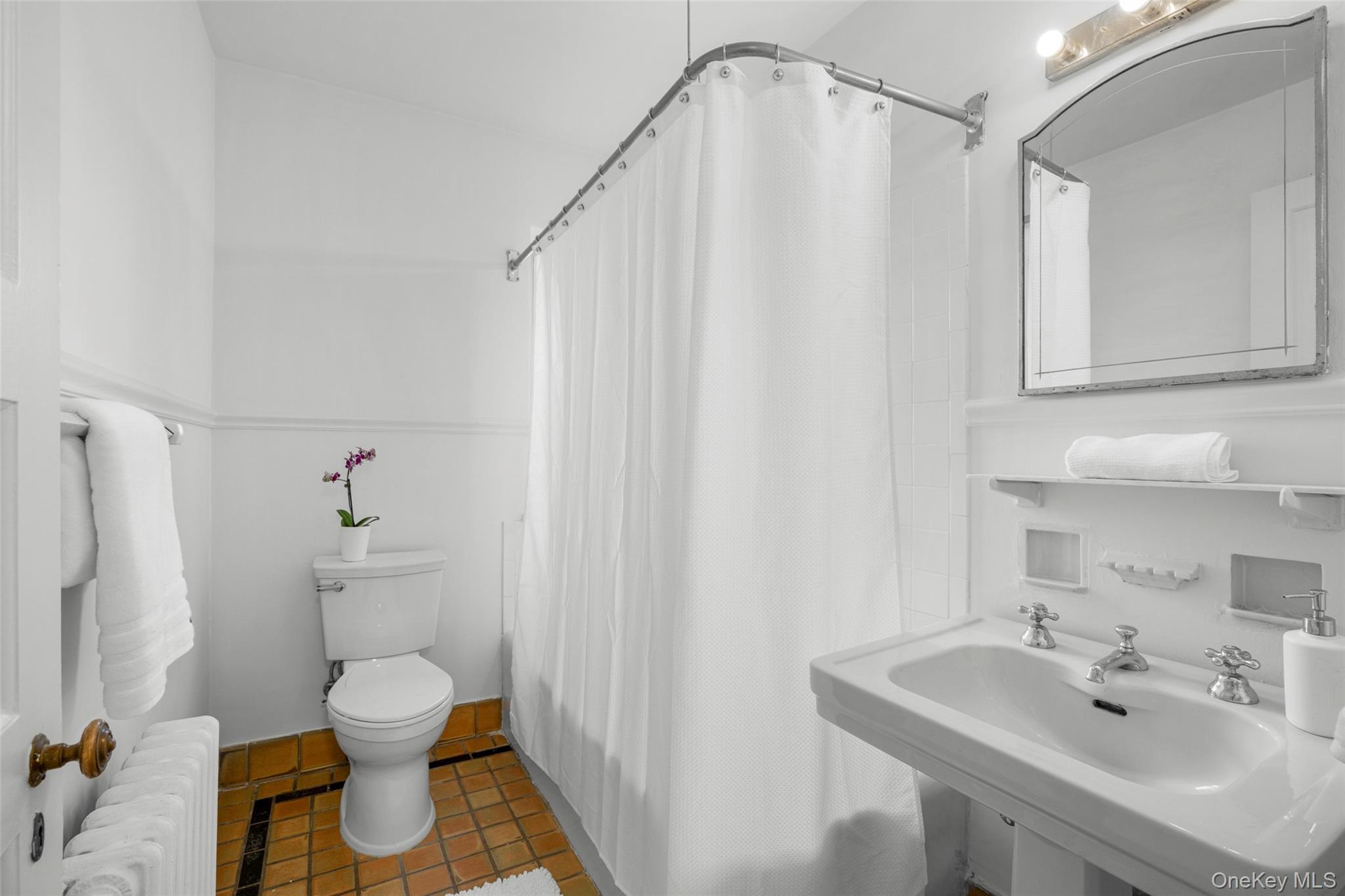 60 Wildwood Road New Rochelle, NY 10804 - Photo 32 of 49 a bathroom with a sink toilet and shower