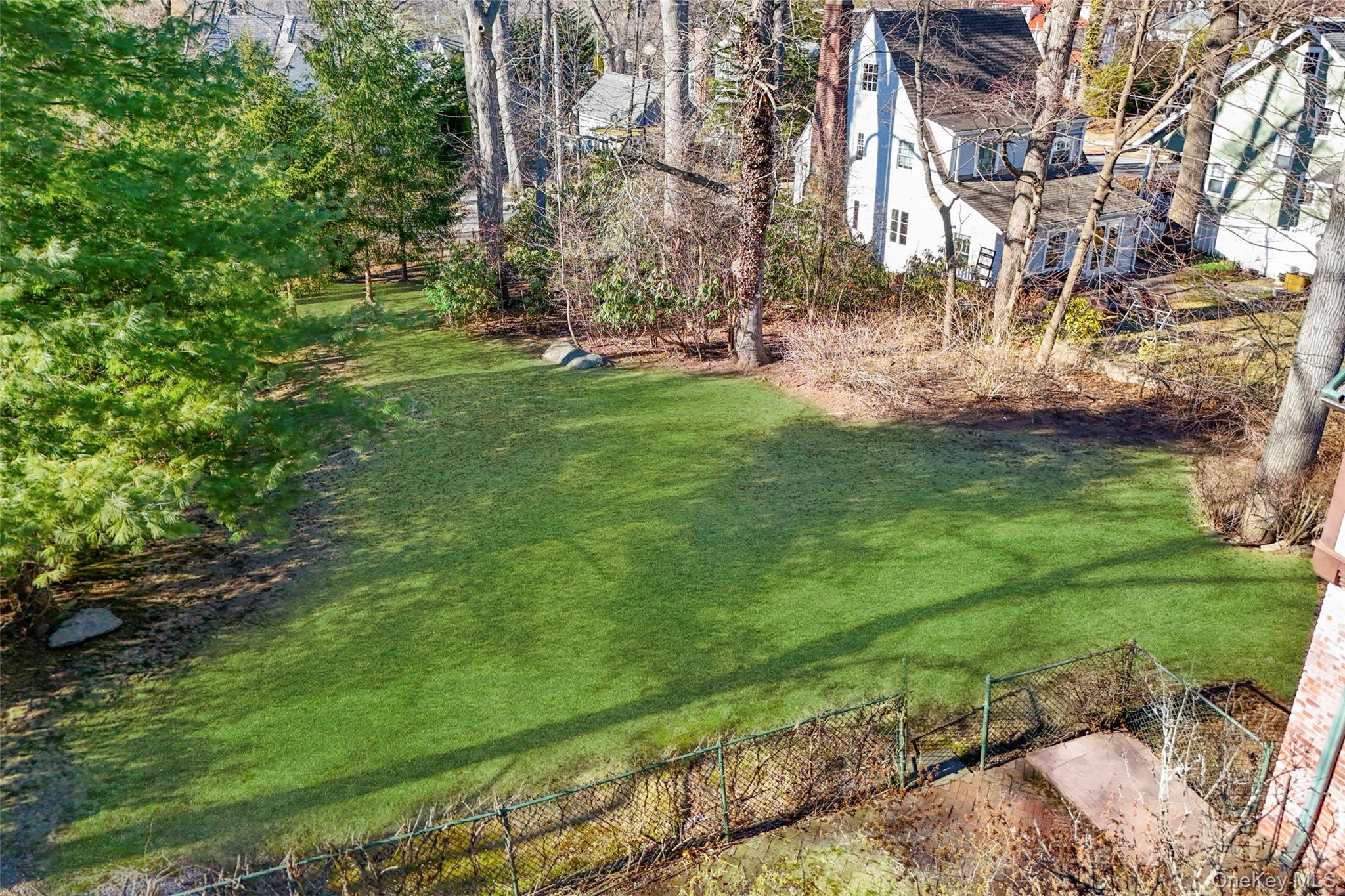 60 Wildwood Road New Rochelle, NY 10804 - Photo 42 of 49 a view of yard with swimming pool and green space