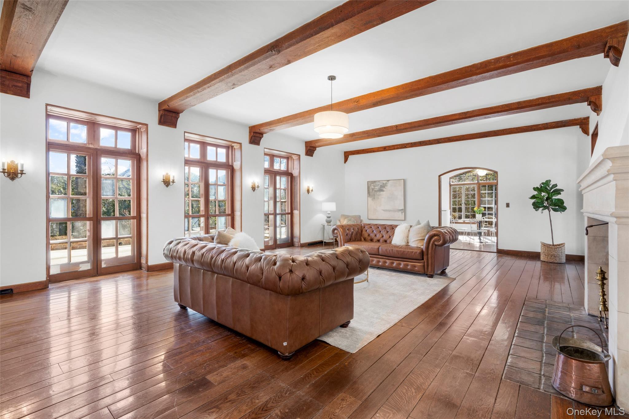 60 Wildwood Road New Rochelle, NY 10804 - Photo 8 of 49 a living room with furniture and a large window