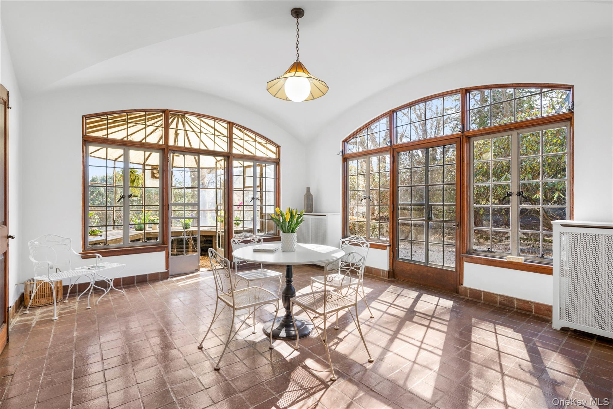 60 Wildwood Road New Rochelle, NY 10804 - Photo 9 of 49 a living room with furniture and floor to ceiling windows
