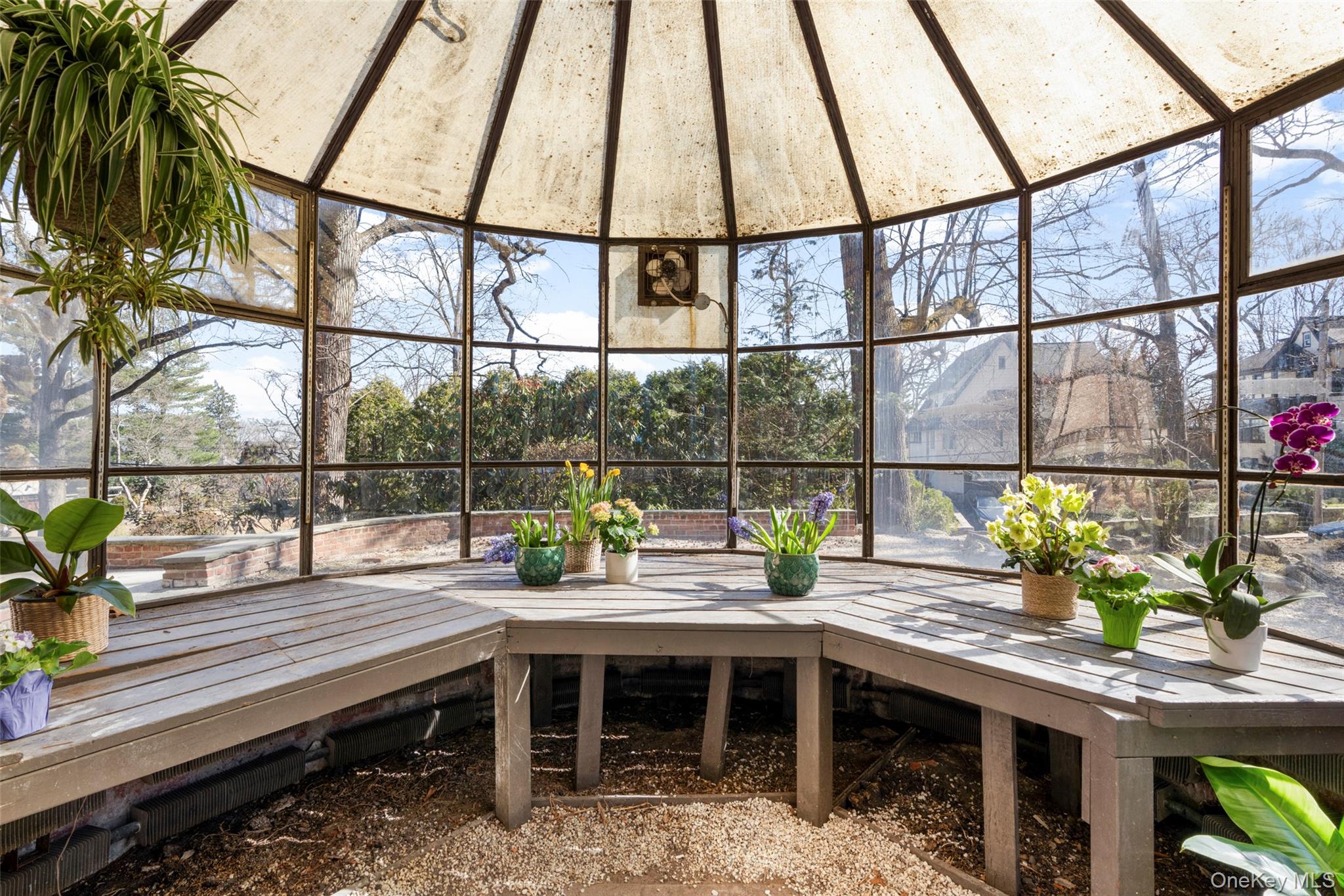 60 Wildwood Road New Rochelle, NY 10804 - Photo 10 of 49 a view of a balcony with wooden floor and outdoor seating