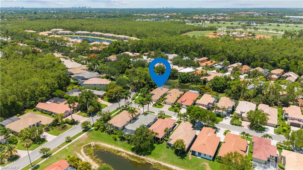 5049 Fairhaven Lane Naples, FL 34109 - Photo 30 of 46 an aerial view of a houses with a yard