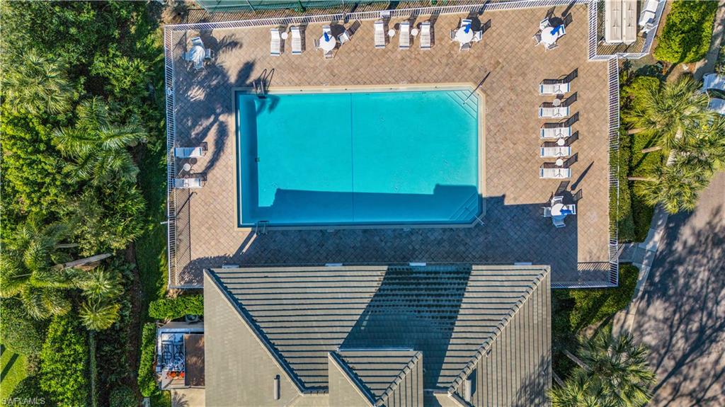 5049 Fairhaven Lane Naples, FL 34109 - Photo 36 of 46 a view of a building with a tree