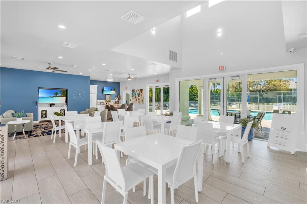 5049 Fairhaven Lane Naples, FL 34109 - Photo 43 of 46 a view of a dining room with furniture window and outside view