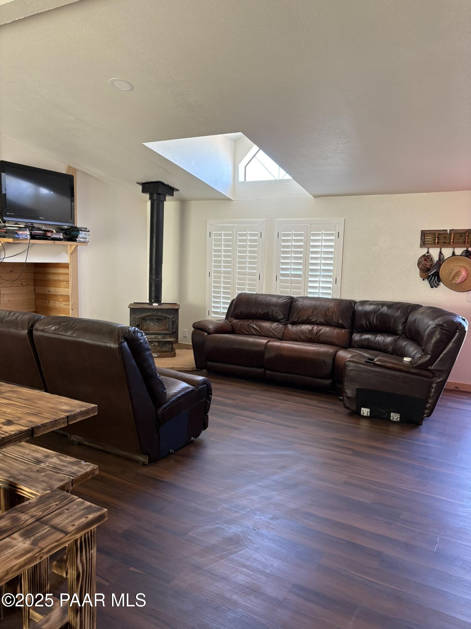 42650 North Wayne Road Ash Fork, AZ 86320 - Photo 25 of 37 a living room with furniture and a wooden floor