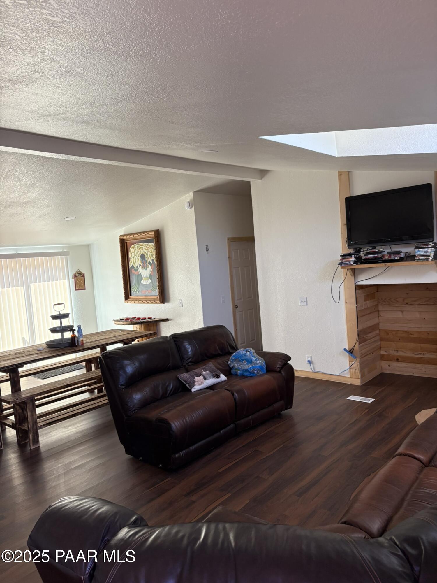 42650 North Wayne Road Ash Fork, AZ 86320 - Photo 30 of 37 a living room with furniture and a flat screen tv