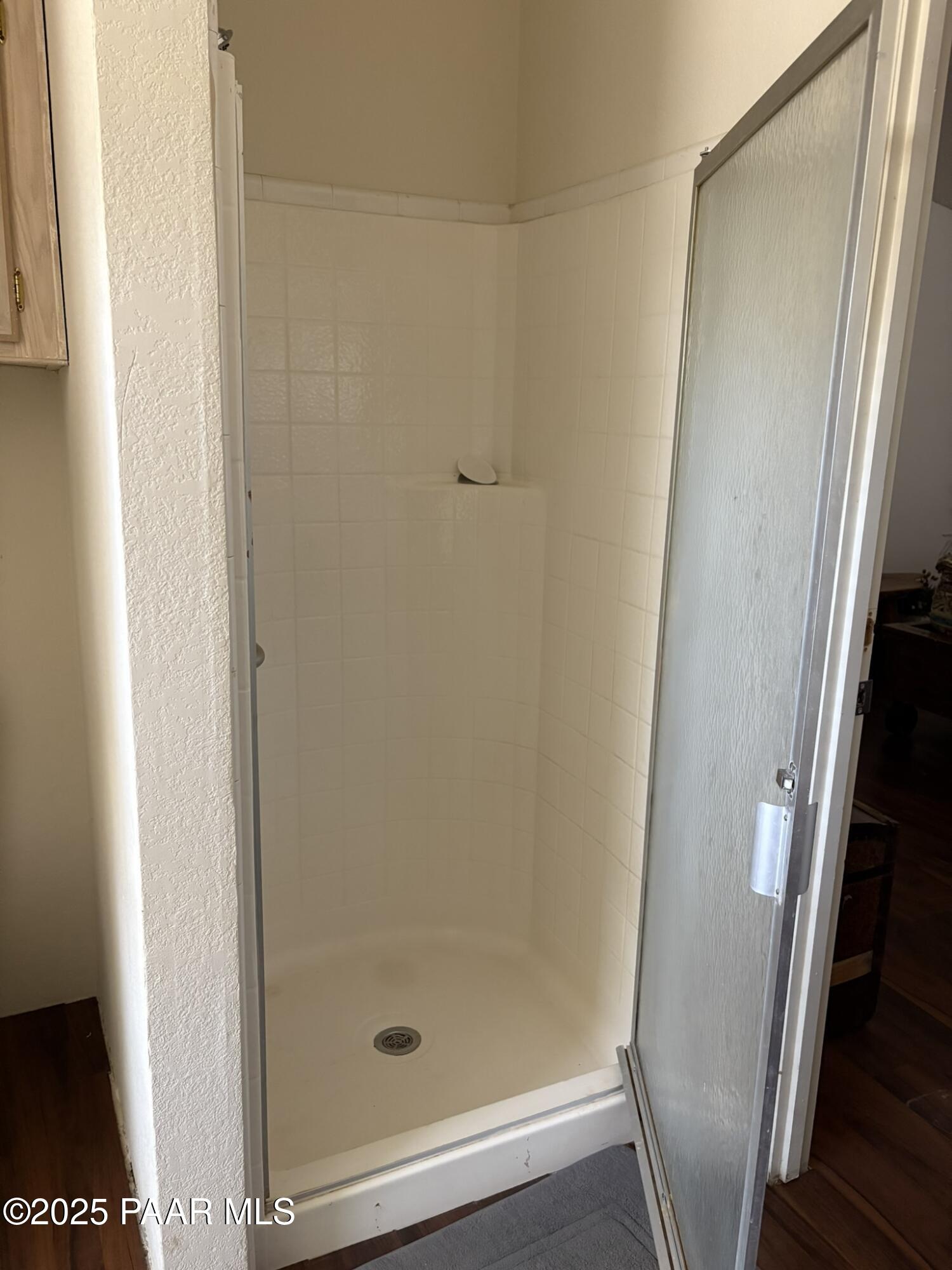 42650 North Wayne Road Ash Fork, AZ 86320 - Photo 32 of 37 a bathroom with a glass door shower