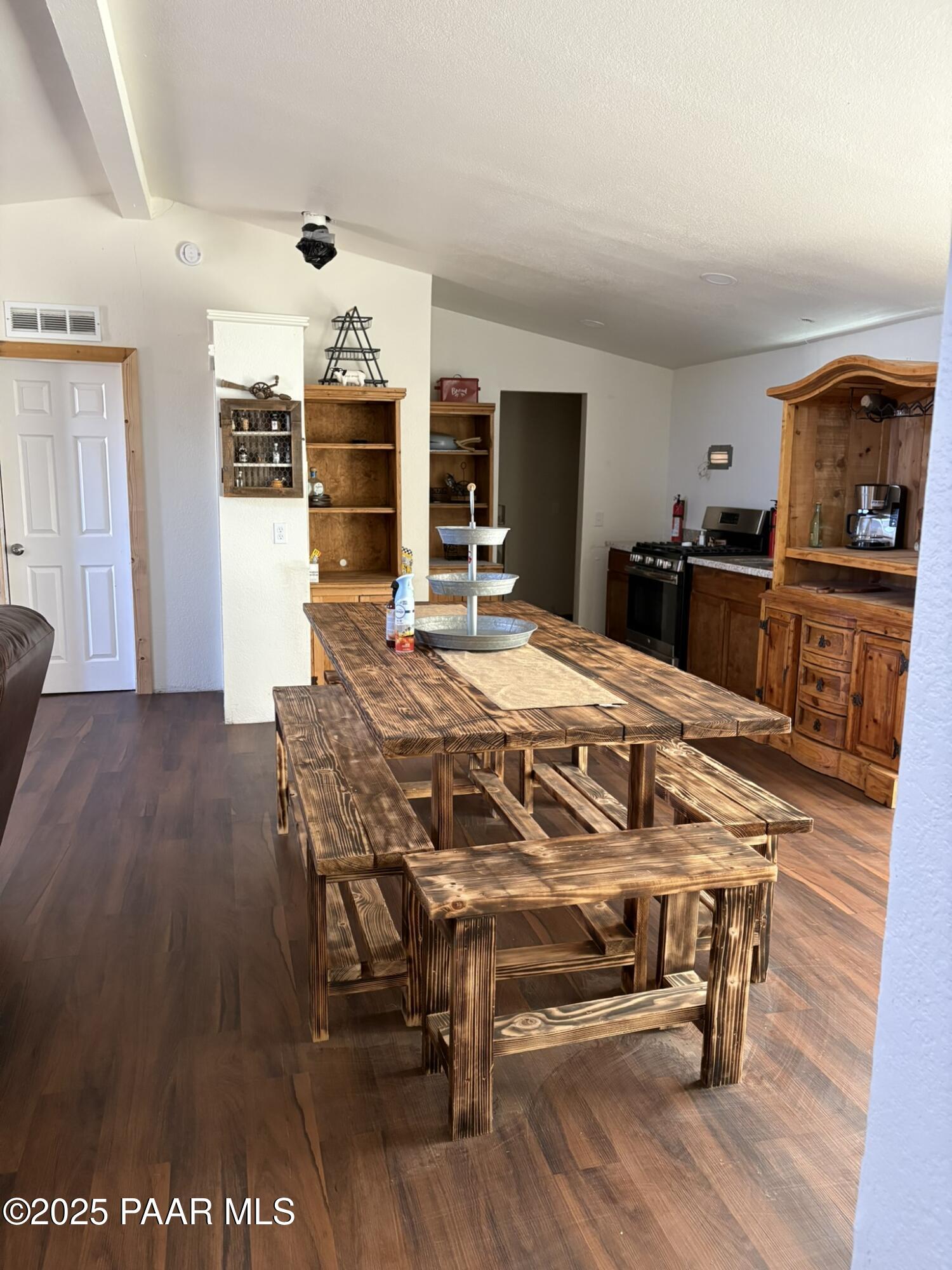 42650 North Wayne Road Ash Fork, AZ 86320 - Photo 37 of 37 a view of a dining room with furniture and wooden floor