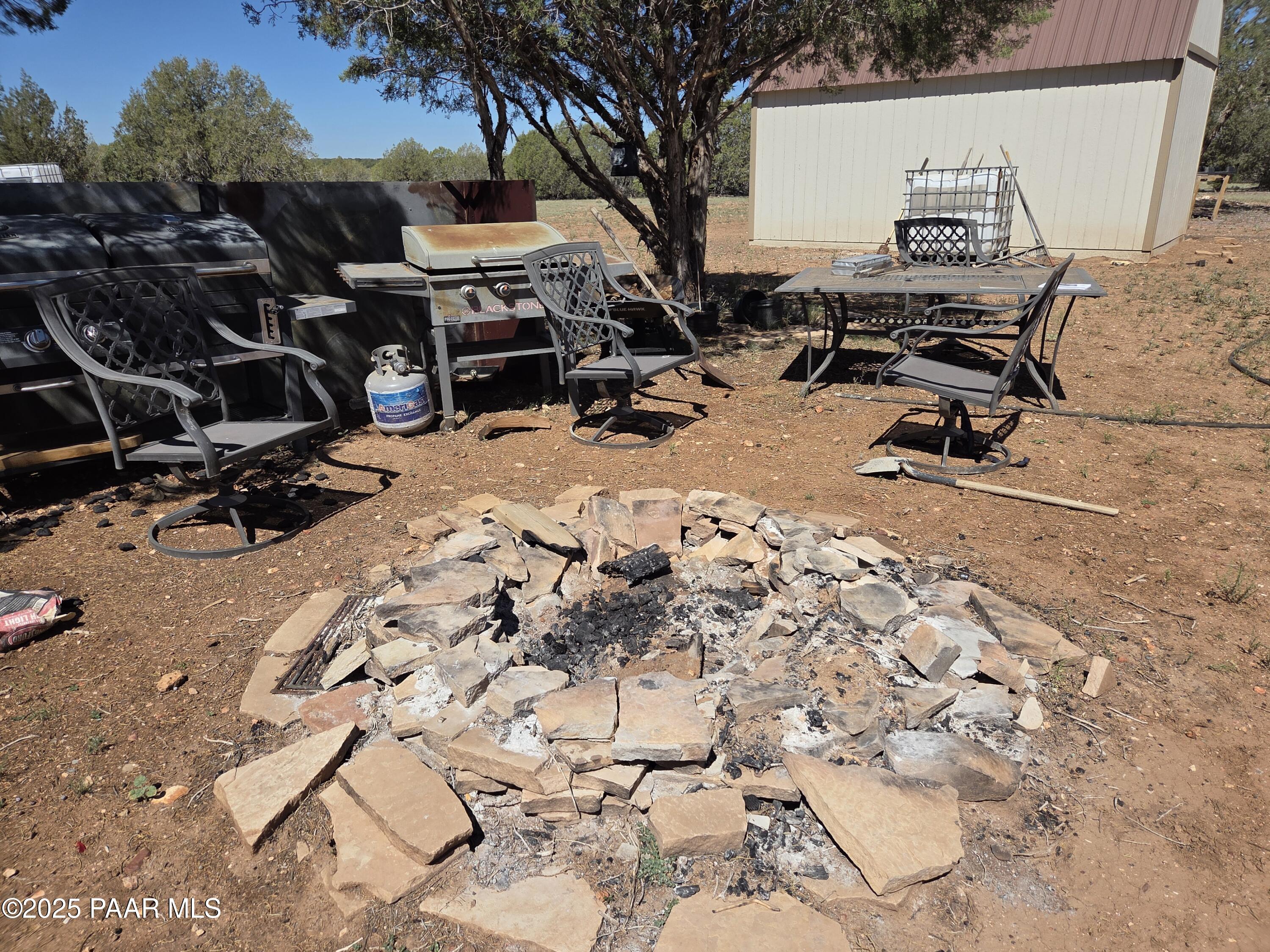 42650 North Wayne Road Ash Fork, AZ 86320 - Photo 7 of 37 a view of a backyard with sitting area