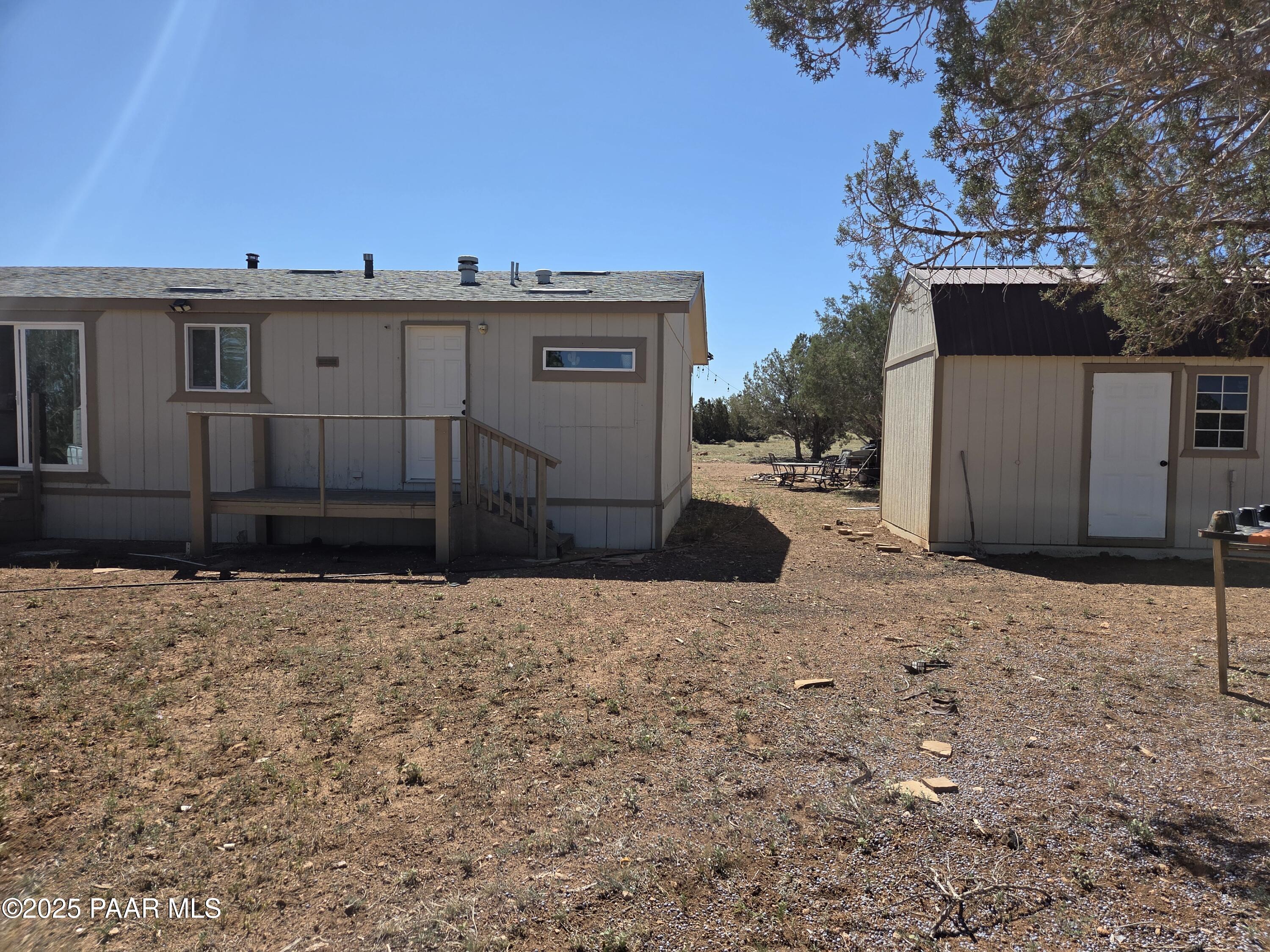 42650 North Wayne Road Ash Fork, AZ 86320 - Photo 10 of 37 a view of a house with a snow in the background