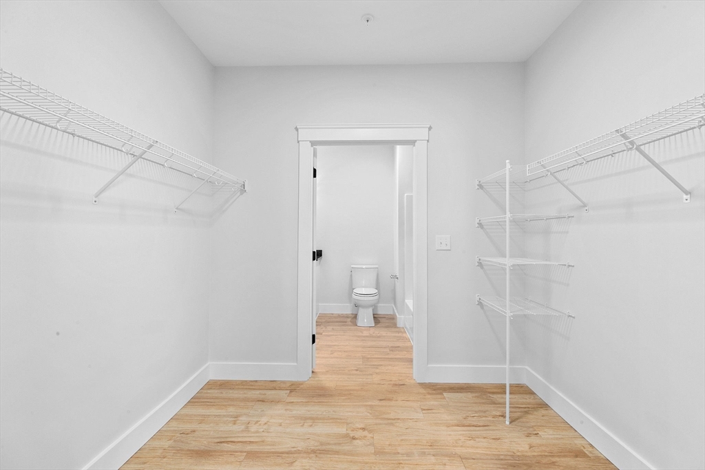 57 Long Point Road, Unit 210 Lakeville, MA 02347 - Photo 14 of 27 a view of wooden floor