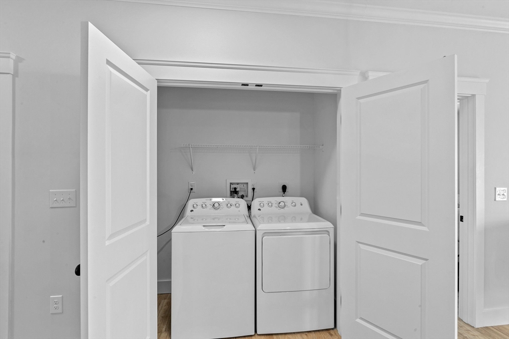 57 Long Point Road, Unit 210 Lakeville, MA 02347 - Photo 18 of 27 a utility room with dryer and washer