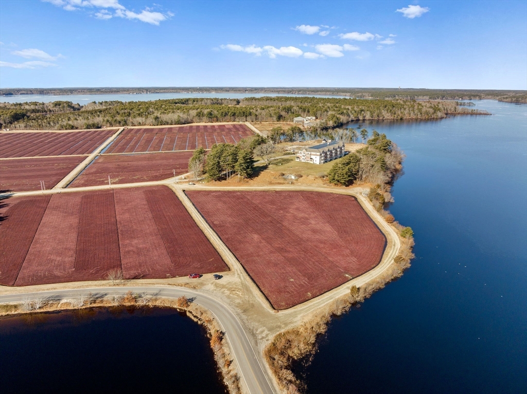 57 Long Point Road, Unit 210 Lakeville, MA 02347 - Photo 26 of 27 a view of a tennis court
