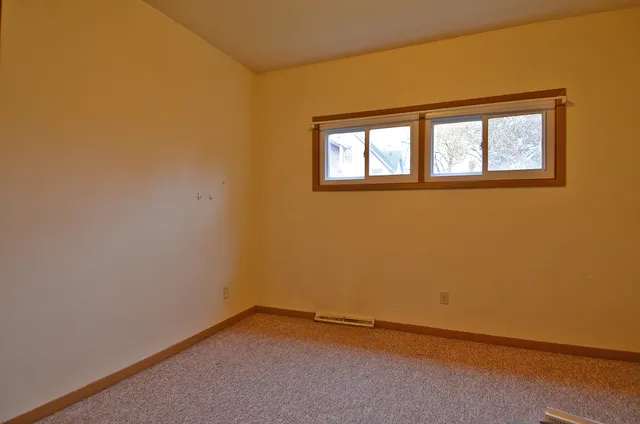 an empty room with a window
