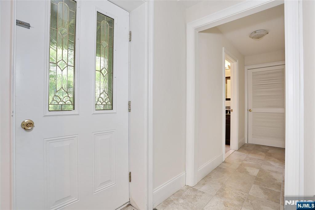 65 Ross Avenue Demarest, NJ 07627 - Photo 41 of 48 an empty room with windows and closet
