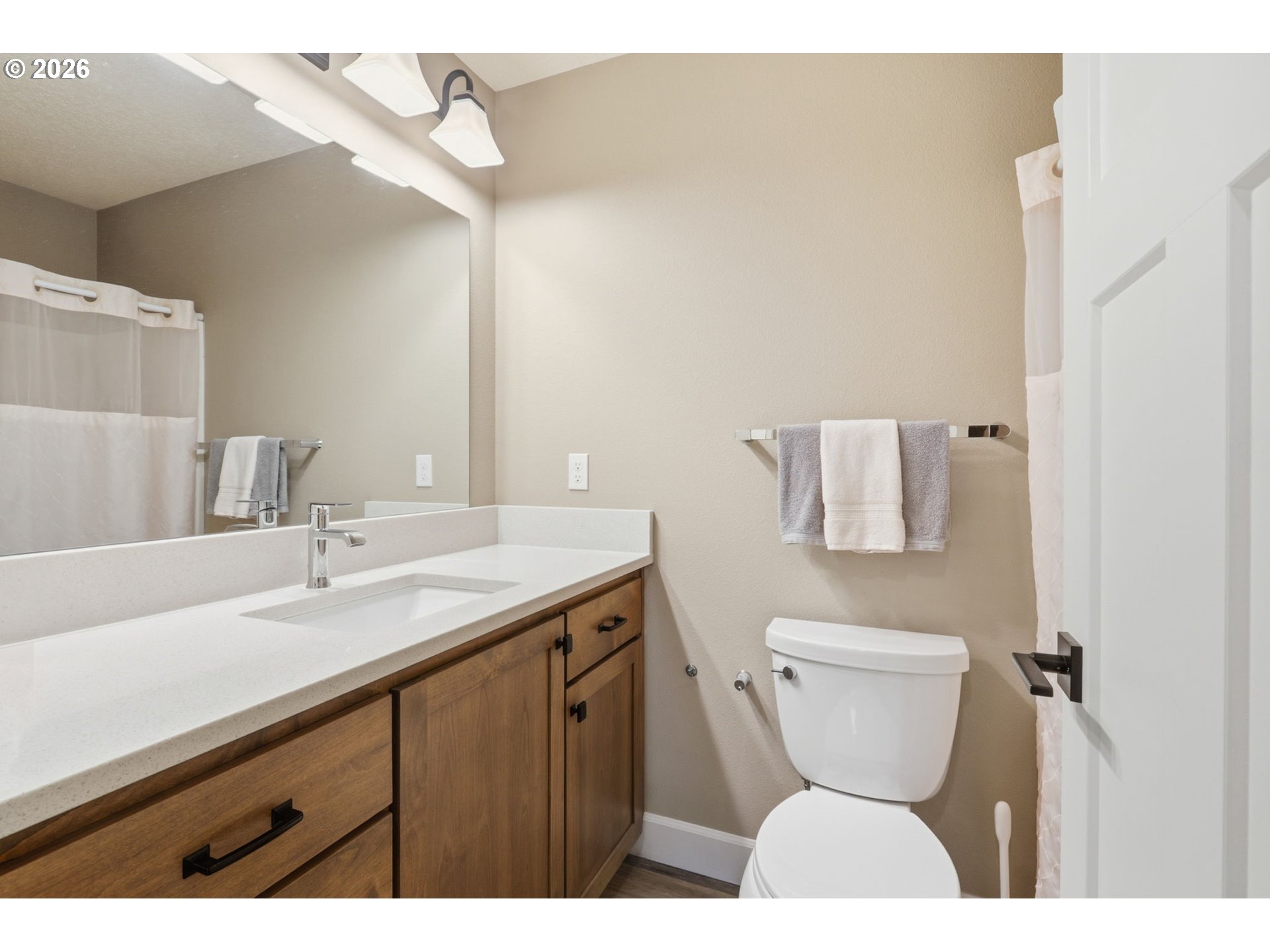 16994 University Avenue Sandy, OR 97055 - Photo 8 of 22 a bathroom with a toilet sink and mirror