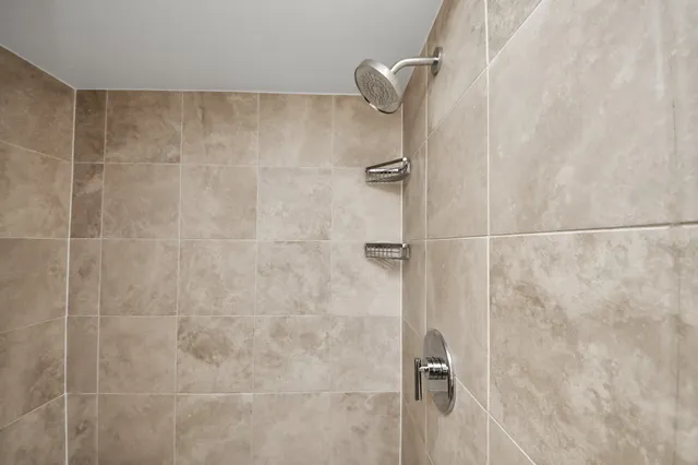 a close view of a bathroom shower