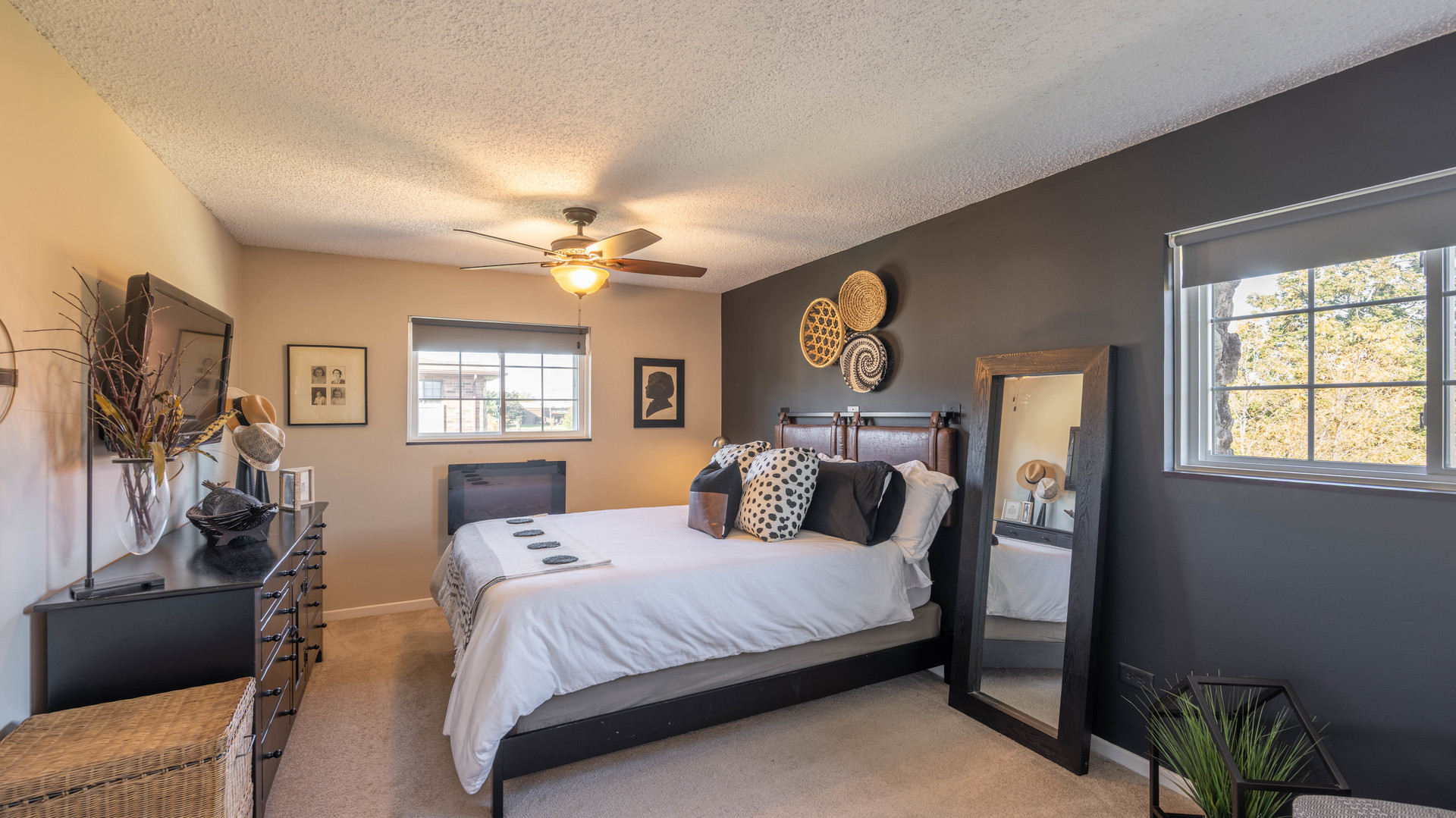 1234 Chalet Road, Unit 301 Naperville, IL 60563 - Photo 11 of 18 a bedroom with a bed and a chandelier