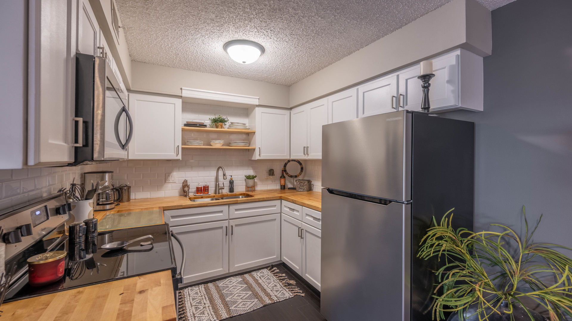 1234 Chalet Road, Unit 301 Naperville, IL 60563 - Photo 10 of 18 a white refrigerator freezer sitting inside of a kitchen