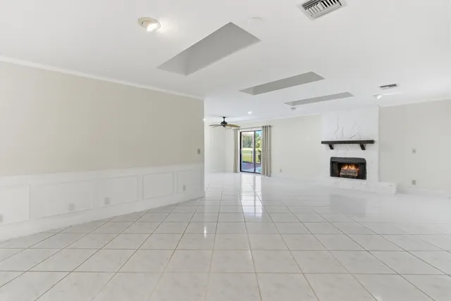 a view of a kitchen with a sink and dishwasher cabinet