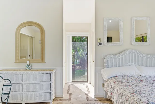 an aerial view of a house with a swimming pool outdoor seating and yard