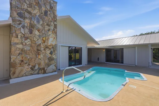 a group of people sitting in a living room