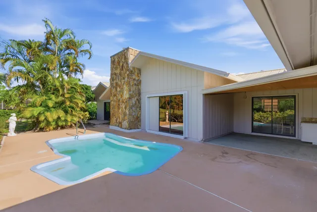a view of a balcony with chairs