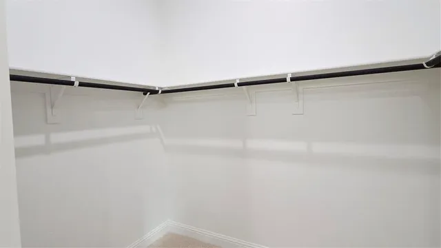 a view of small space with racks on the wall