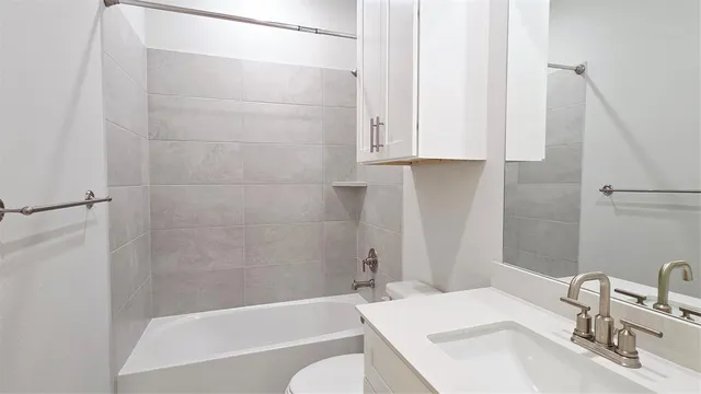 a bathroom with a sink and a bathtub