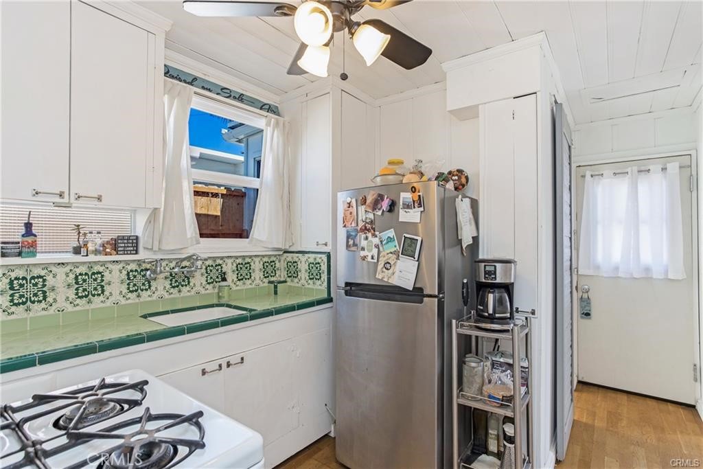 31711 Fairview Road Laguna Beach, CA 92651 - Photo 12 of 20 a view of a bedroom with window and wooden floor