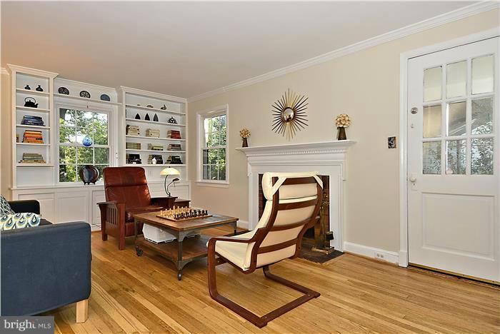 321 Penwood Road Silver Spring, MD 20901 - Photo 5 of 22 Living Room with Fireplace and Built Ins