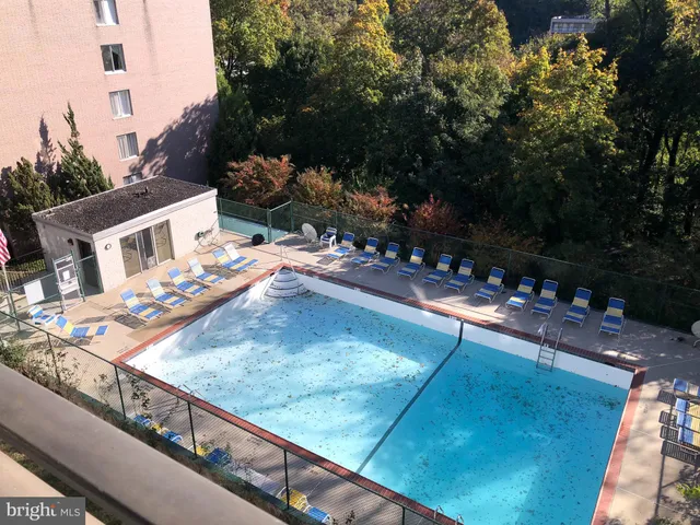 a view of a balcony with chairs