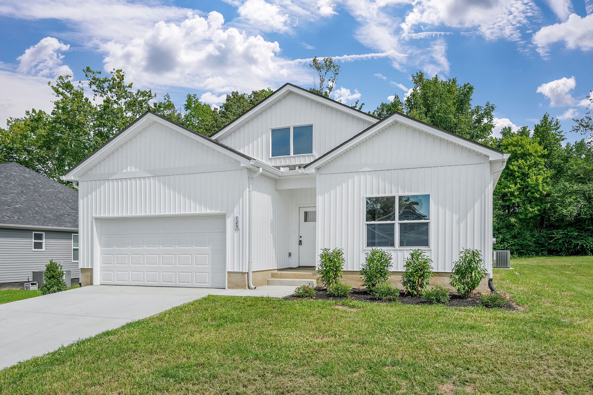 125 Reece Road Baxter, TN 38544 - Photo 1 of 31 a view of front a house with a yard and potted plants