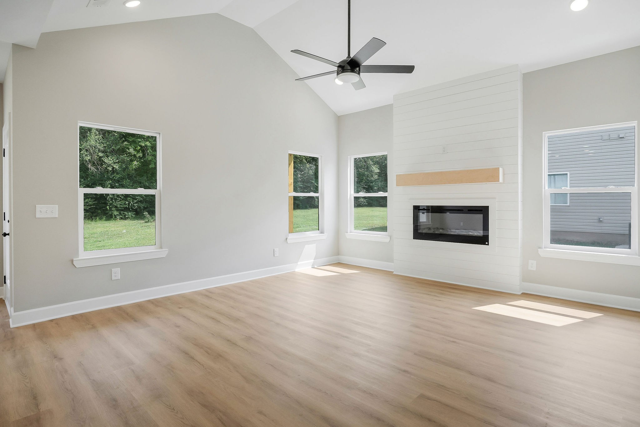 125 Reece Road Baxter, TN 38544 - Photo 10 of 31 a view of an empty room with a window and fireplace