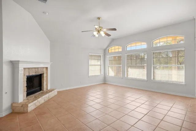 a view of empty room with windows