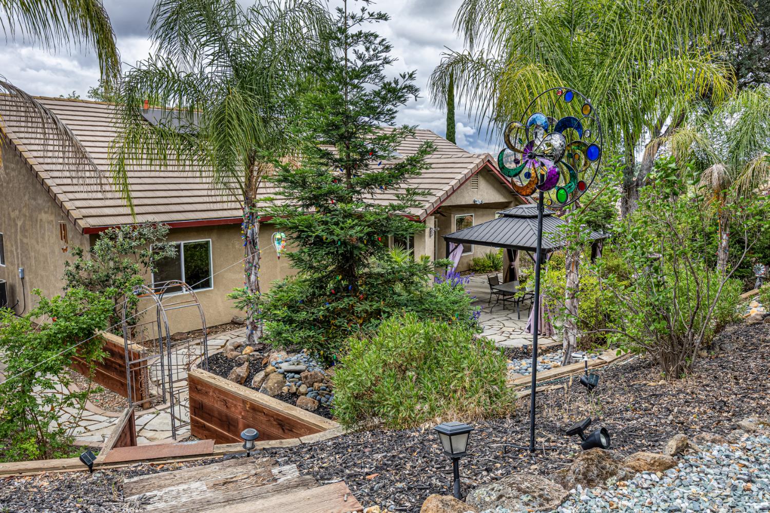 2083 State Rte 26 Valley Springs, CA 95252 - Photo 33 of 59 a front view of a house with garden