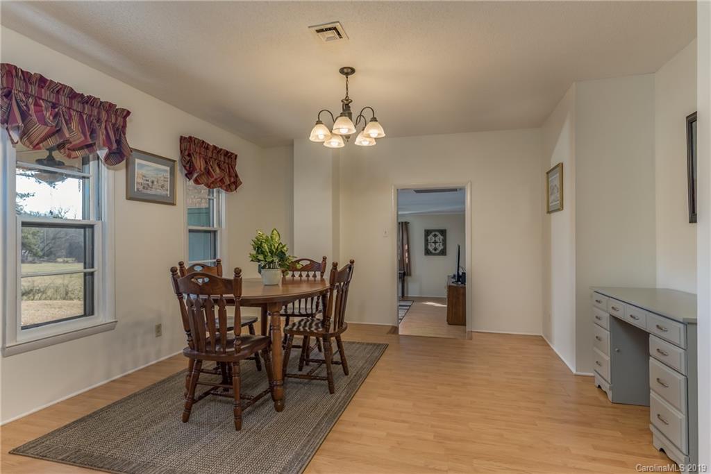 1014 South Main Street Rutherfordton, NC 28139 - Photo 14 of 31 a view of a dining room with furniture and window