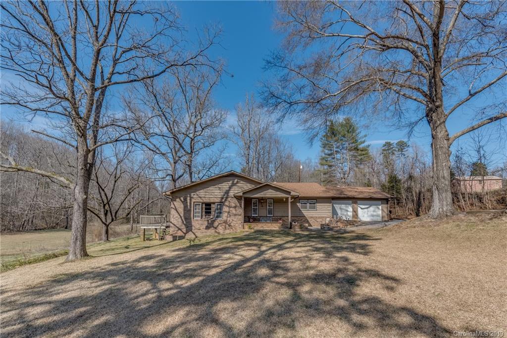 1014 South Main Street Rutherfordton, NC 28139 - Photo 22 of 31 a backyard of a house with large trees and outdoor space