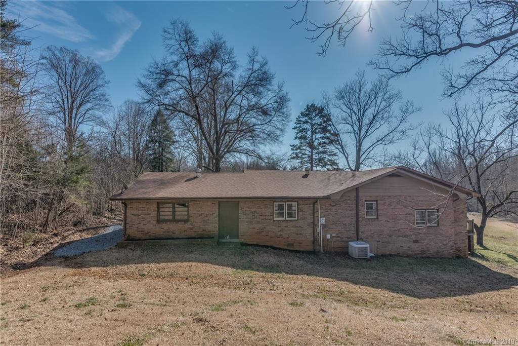1014 South Main Street Rutherfordton, NC 28139 - Photo 23 of 31 a front view of a house with a yard and garage