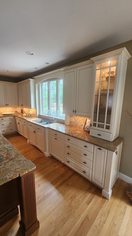 41 Christopher Drive Westfield, MA 01085 - Photo 14 of 42 a kitchen with granite countertop a sink and a stove top oven