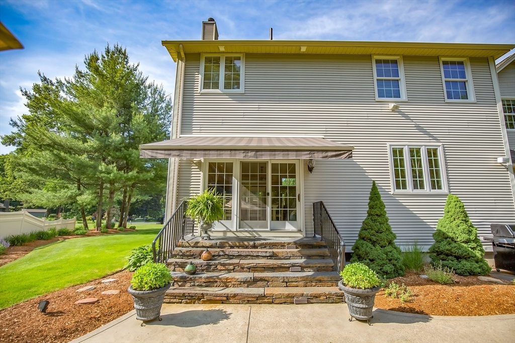 41 Christopher Drive Westfield, MA 01085 - Photo 2 of 42 a front view of a house with a yard