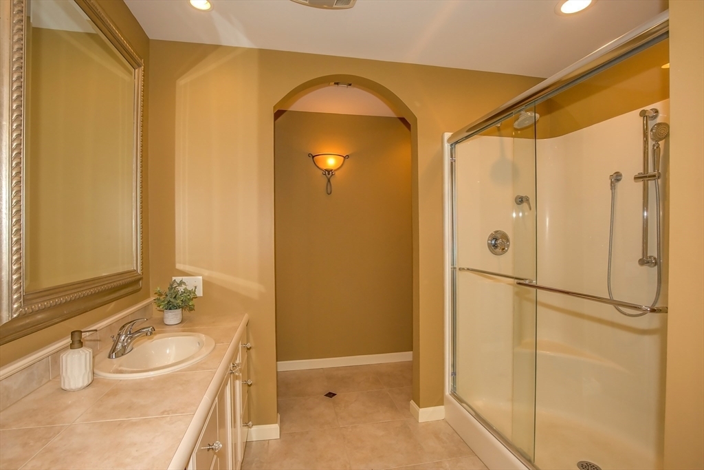 41 Christopher Drive Westfield, MA 01085 - Photo 23 of 42 a bathroom with a sink and a mirror