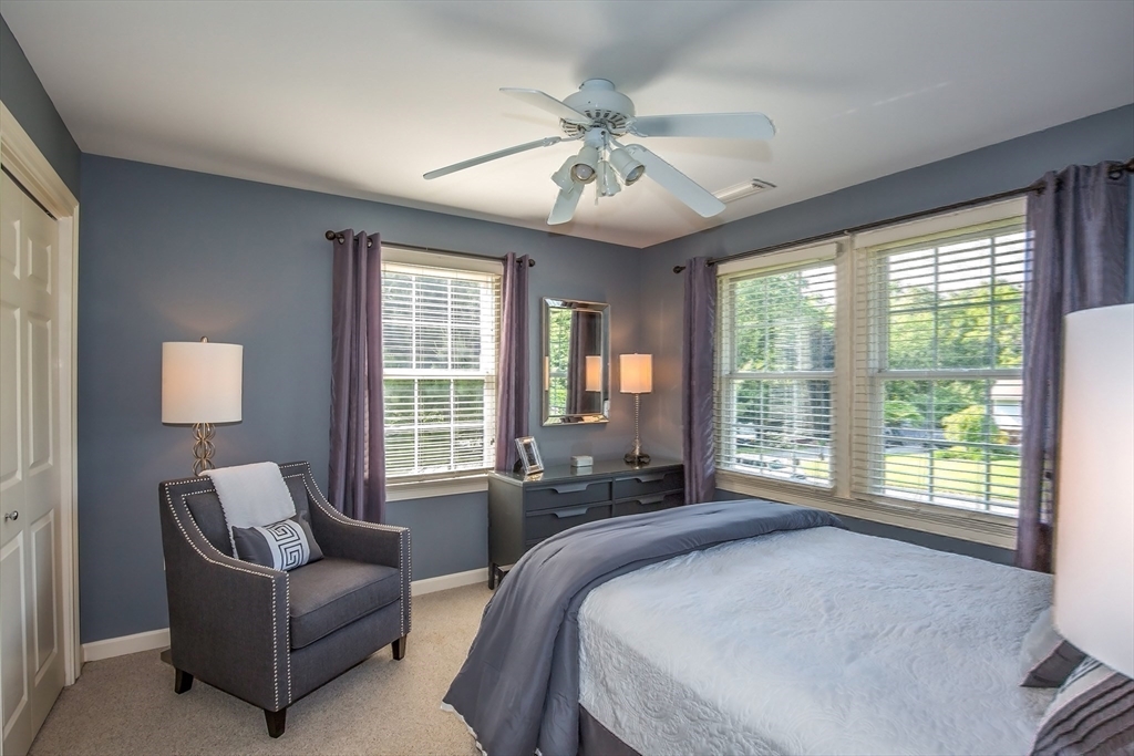 41 Christopher Drive Westfield, MA 01085 - Photo 28 of 42 a bedroom with a large bed and a large window