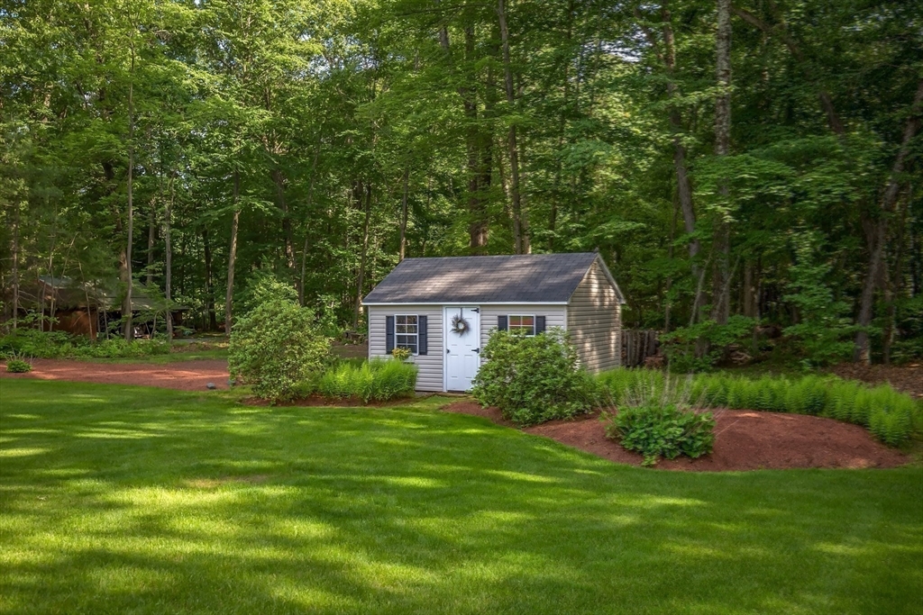 41 Christopher Drive Westfield, MA 01085 - Photo 33 of 42 a view of a house with a big yard potted plants and large tree