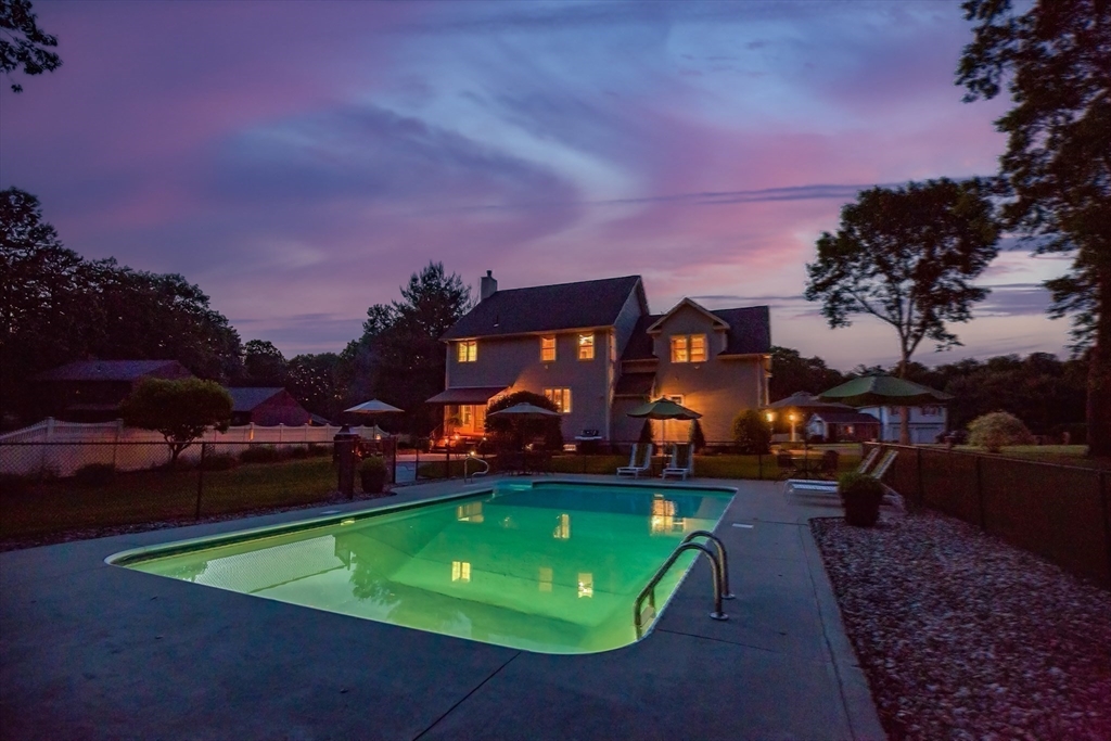 41 Christopher Drive Westfield, MA 01085 - Photo 39 of 42 a view of a big yard with table and chairs under an umbrella