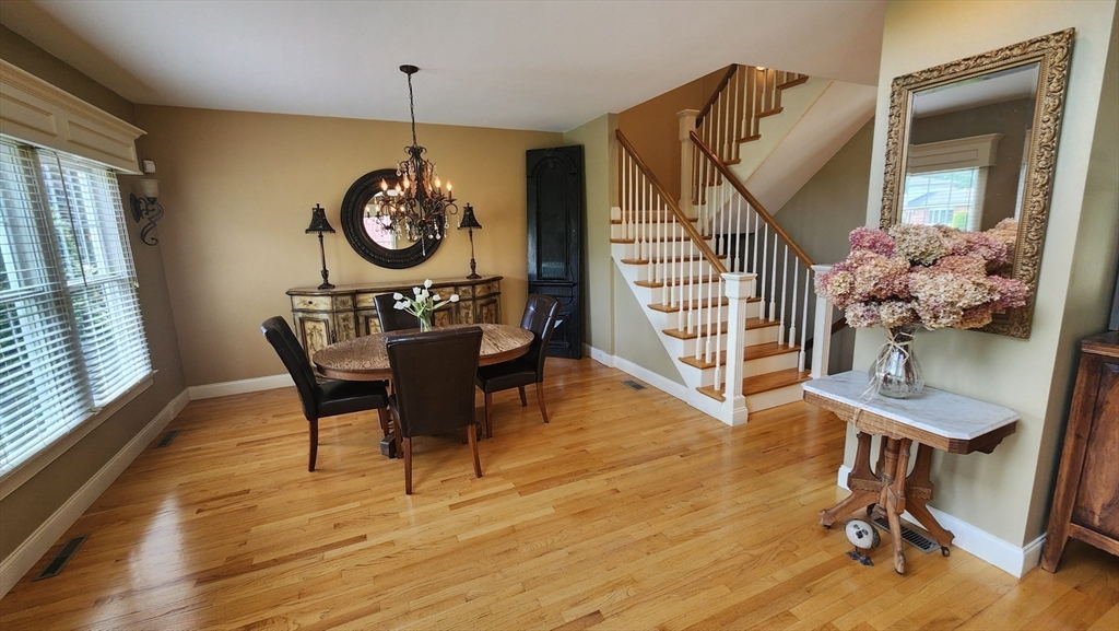 41 Christopher Drive Westfield, MA 01085 - Photo 6 of 42 a view of a dining room with furniture window and wooden floor