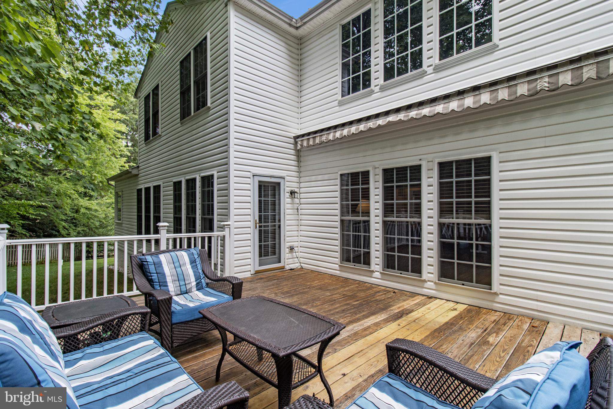 706 Darlow Drive Annapolis, MD 21409 - Photo 25 of 34 Rear deck with retractable awning