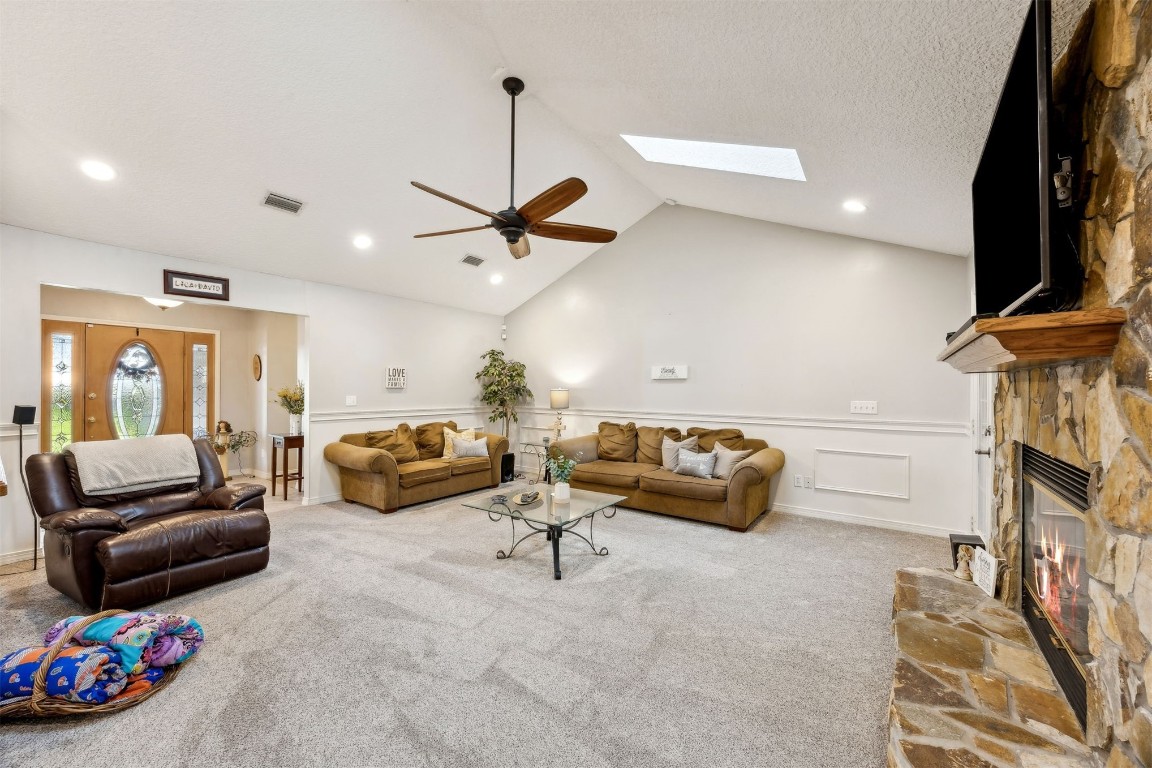 97535 Pirates Point Road Yulee, FL 32097 - Photo 14 of 59 a living room with furniture and a flat screen tv