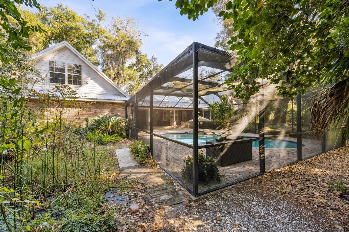 97535 Pirates Point Road Yulee, FL 32097 - Photo 50 of 59 a house view with a outdoor space