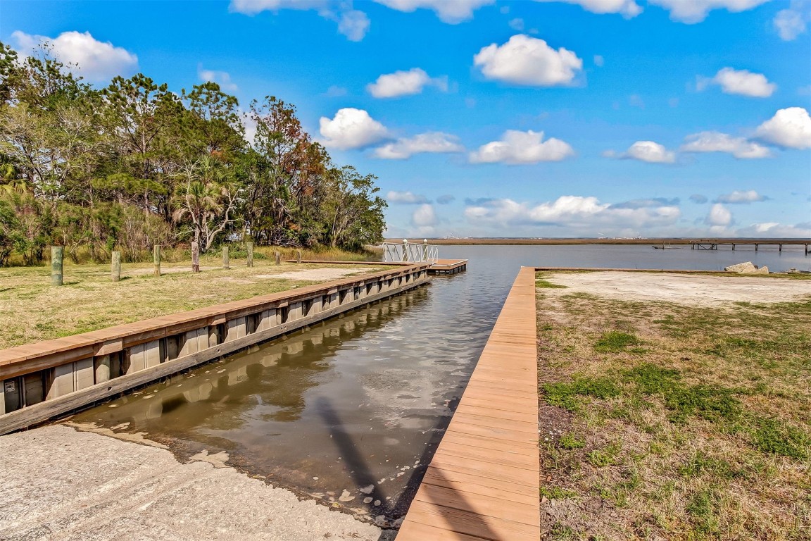 97535 Pirates Point Road Yulee, FL 32097 - Photo 56 of 59 a view of a swimming pool with outdoor seating